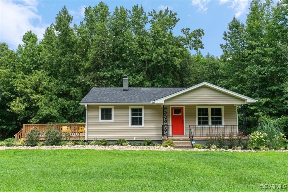 View of front facade featuring covered porch and a