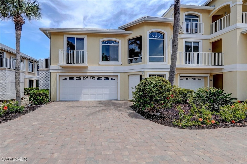 2 story Condominium  with Garage w/ paved driveway