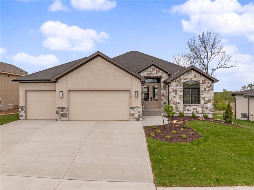 1404 Kintyre Ct, Raymore, MO 64083 - photo 1