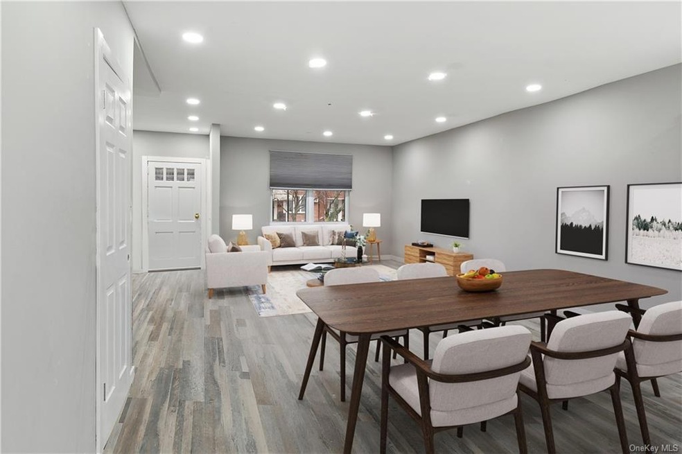 Open Concept Living Room & Dining Room in Main Uni