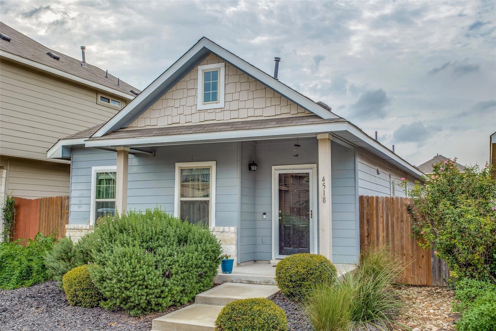 View of front of house featuring fence