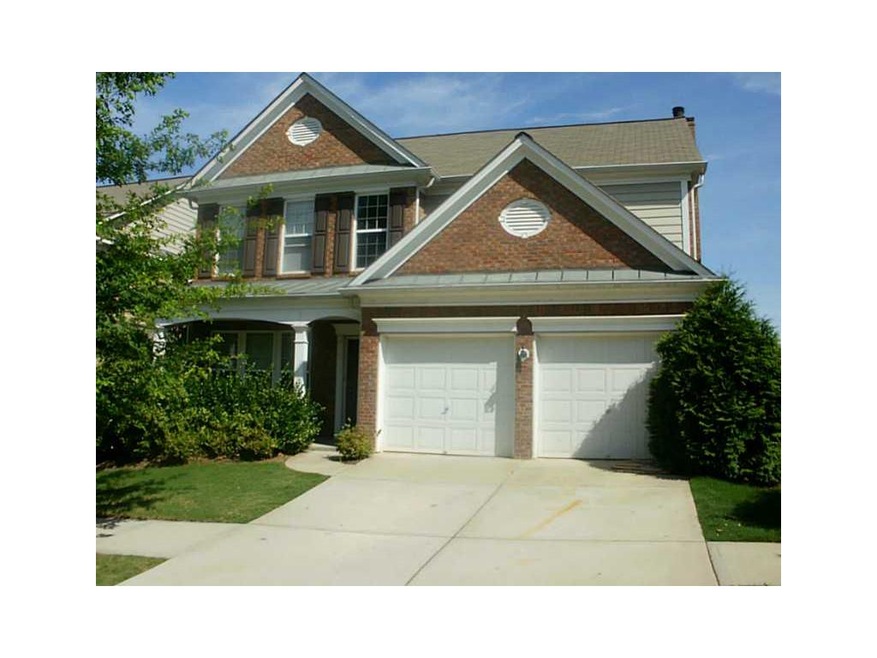 Exterior Front. 3 side brick