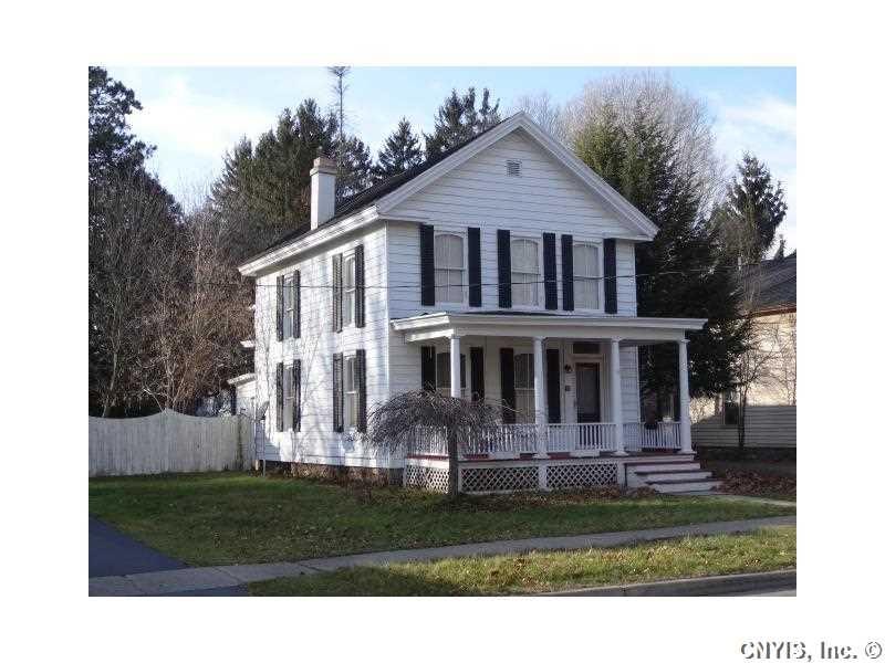 Exterior Front Classic Village colonial w/fenced i