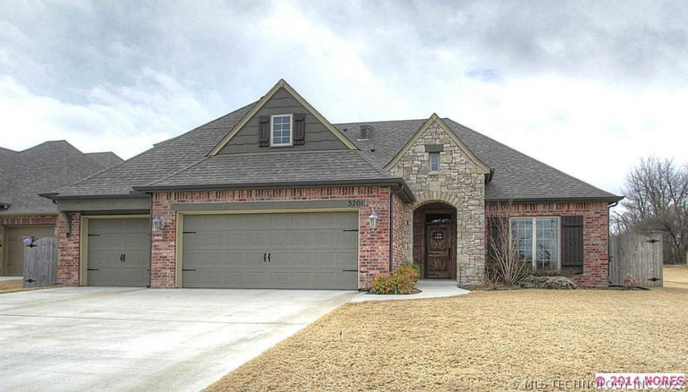Gorgeous full brick and stacked stone home built b