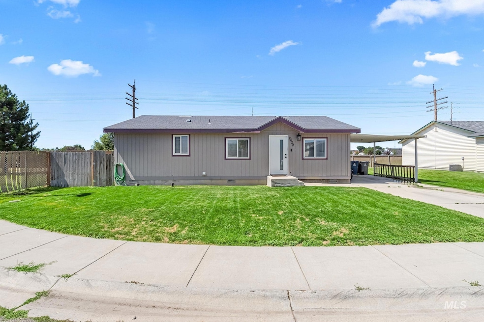View of front with crawl space, concrete driveway, and an attached carport