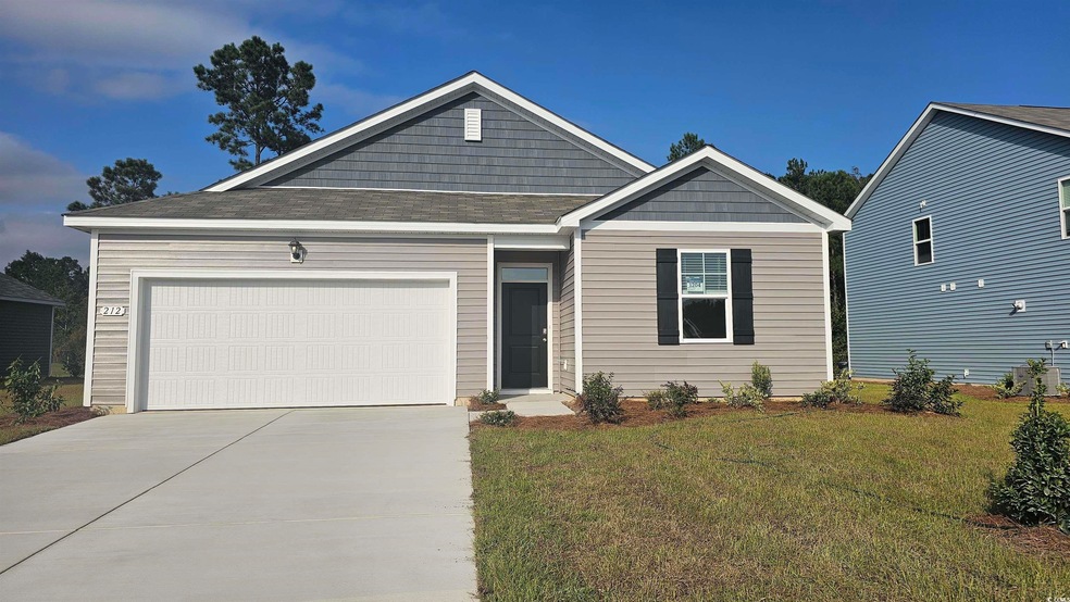 View of front of property featuring a front yard a