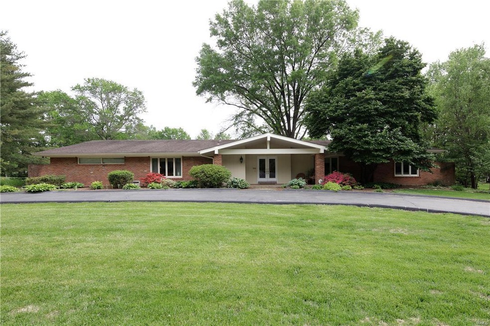 Gorgeous ranch on a parklike acre.  Inviting front