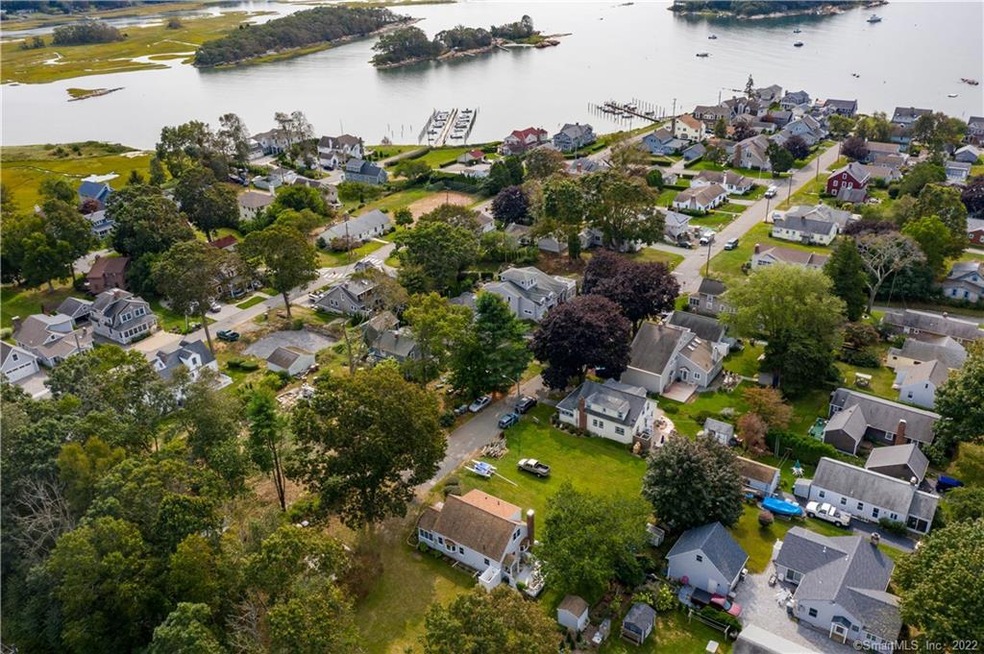 Property is at bottom center, white cape with brow