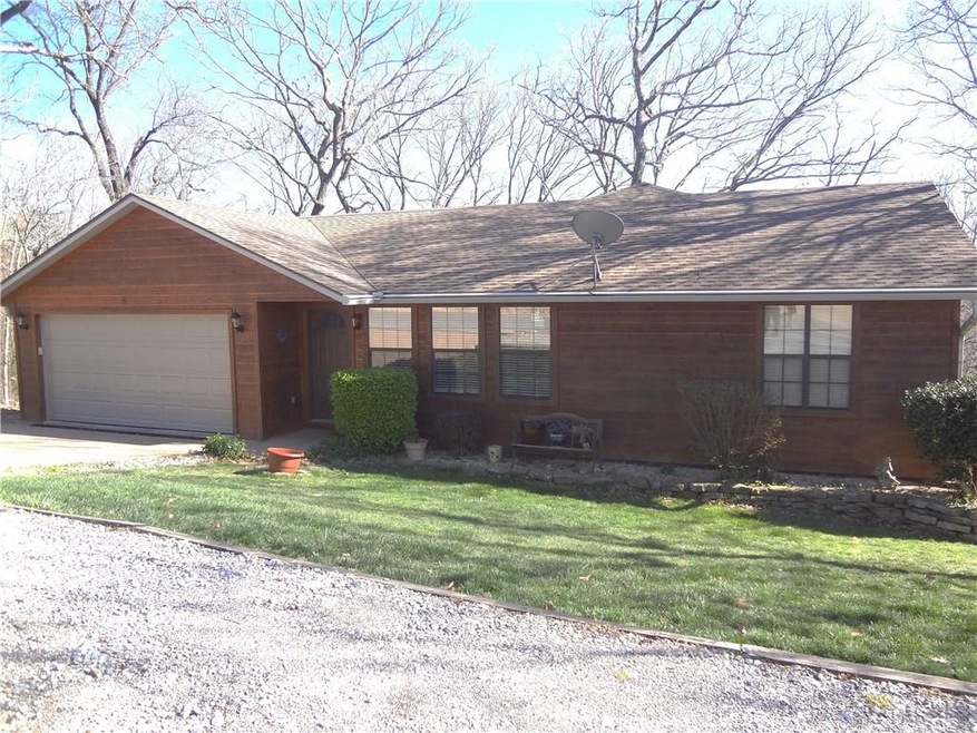 Great home on 2 lots in nice area close in to hwy. 71.