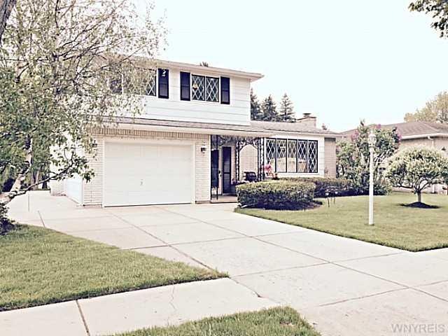 Exterior Front Quiet neighborhood street with a sh