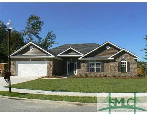 Exterior Front. Brick and vinyl exterior, 2 car ga