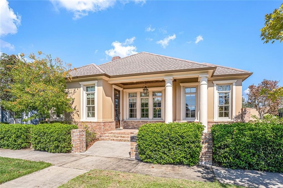 This beautiful home faces the serene and spacious