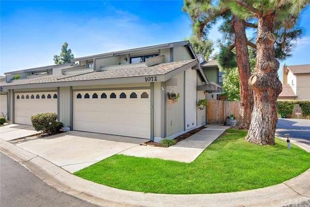 Curbside view of this detached 3 bed/2.5 bath town