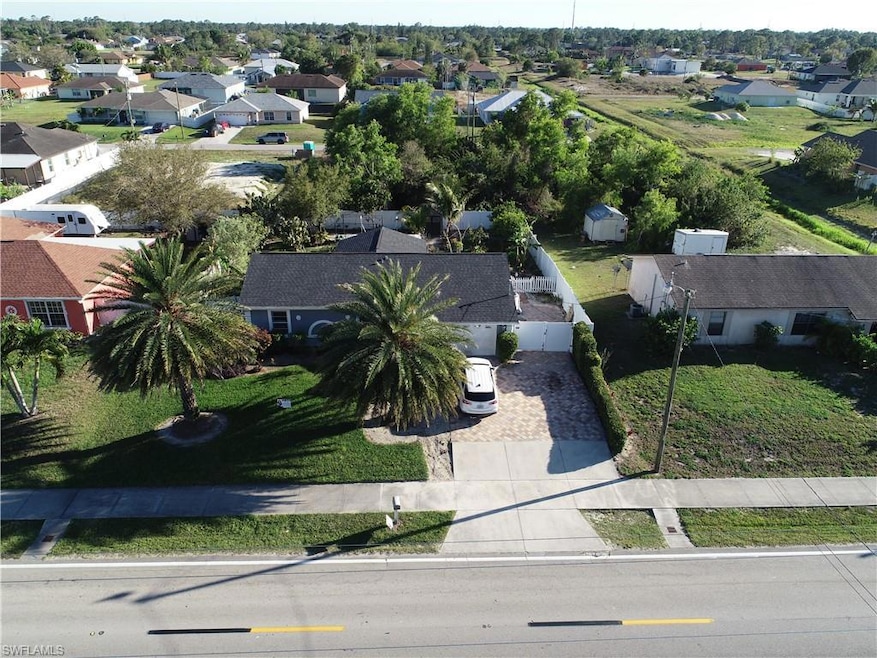 Birds eye view of property with a residential view