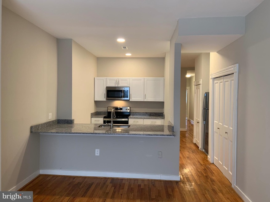 1113 N Calvert St unit B, Baltimore, MD 21202 - photo 1