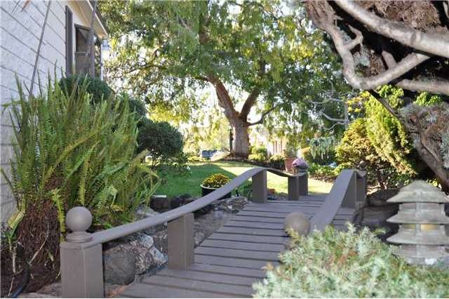 Exterior side yard of spacious corner lot