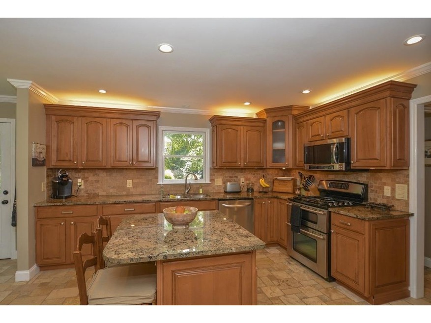 Completely renovated kitchen with travertine tile 