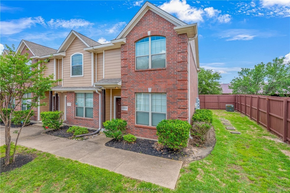 Corner unit with access to the back patio from the