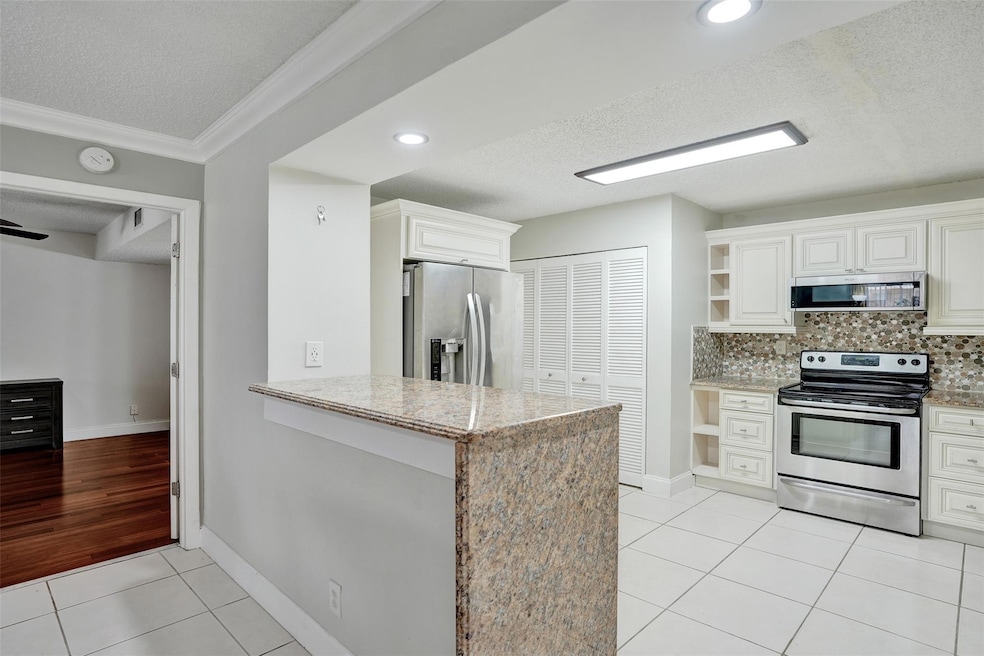 12215 Royal Palm Blvd unit 4Q, Coral Springs, FL 33065 - photo 1
