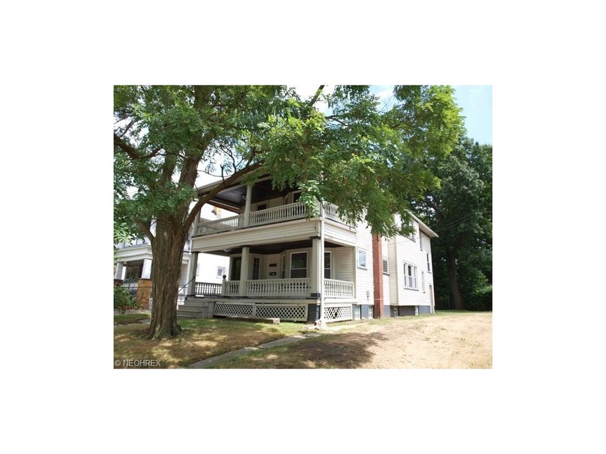 Front of house. Both units have their own front porch