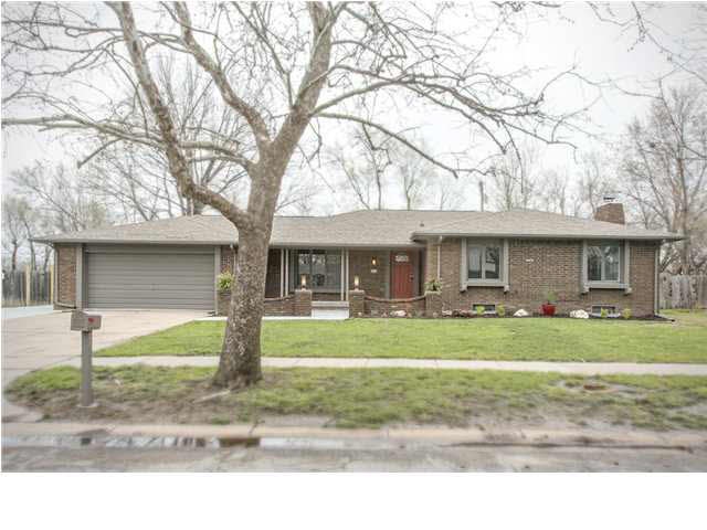Low maintenance exterior with 3 sides of brick and