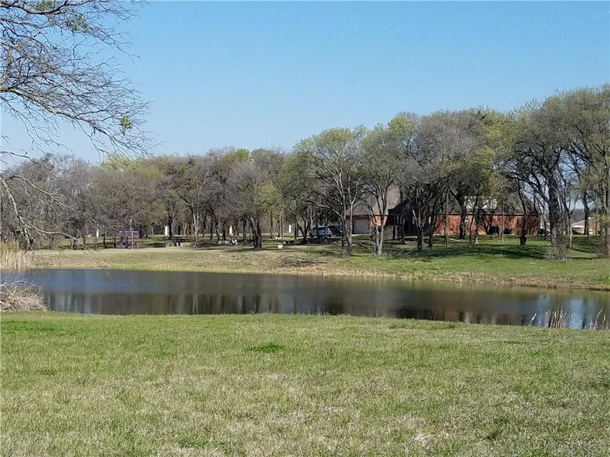 Lot backs up into this pond