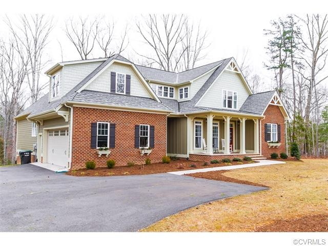 Exterior Front w/ 2 Car Garage & Front Porch