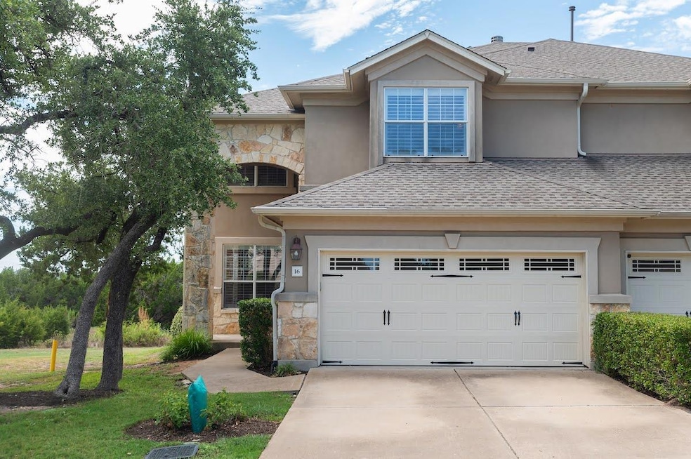 View of front of home featuring concrete driveway