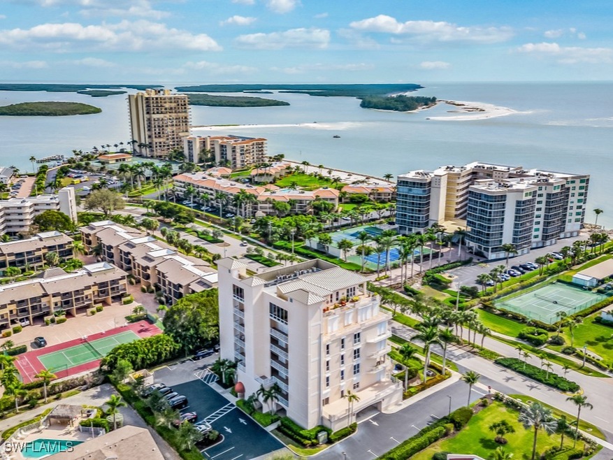 Drone / aerial view featuring a water view and a c