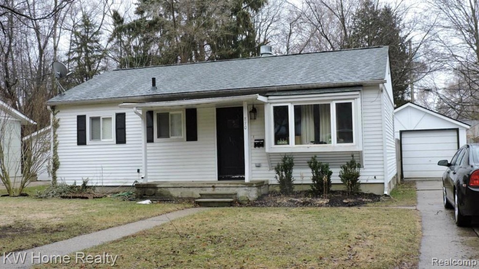 FRONT VIEW of newer roof on the house and garage, 