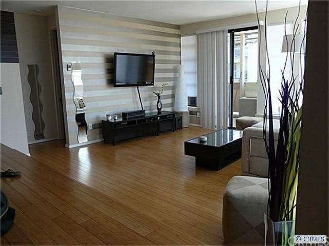 VIEW OF LIVING ROOM FROM KITCHEN/DINING AREA