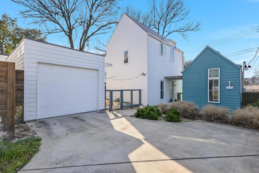 View of front facade featuring an outbuilding, co