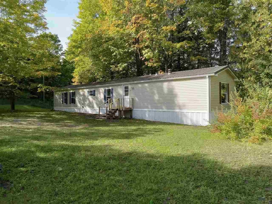 118 Carson Rd, East Jordan, MI 49727 - photo 1