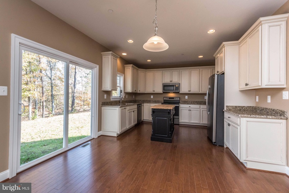 213 Dismondy Dr, Huntingtown, MD 20639 - photo 1