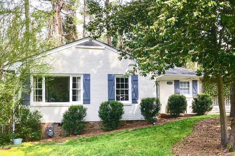 Charming cottage with loads of curb appeal!