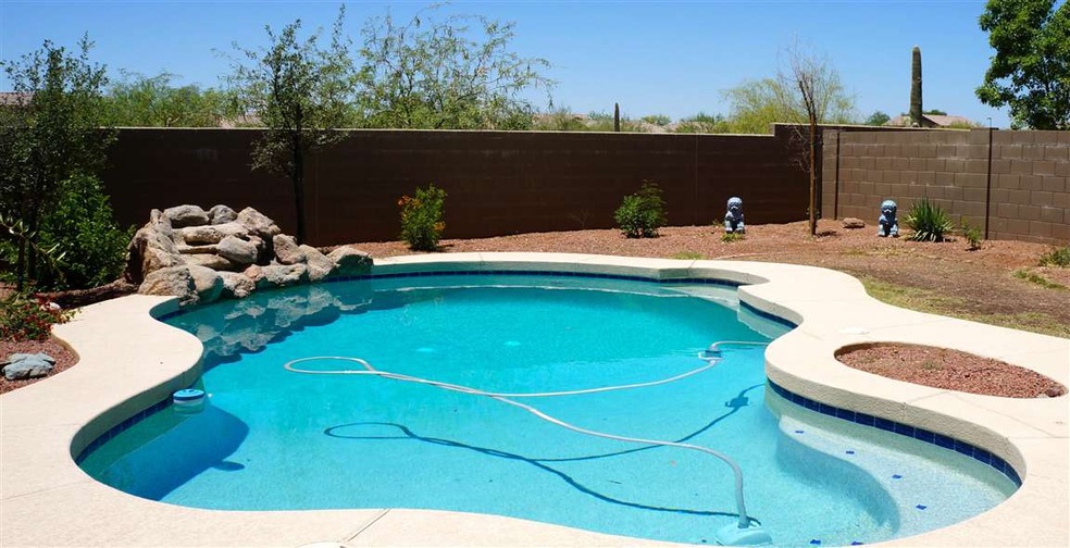 Oversized pool with custom waterfall