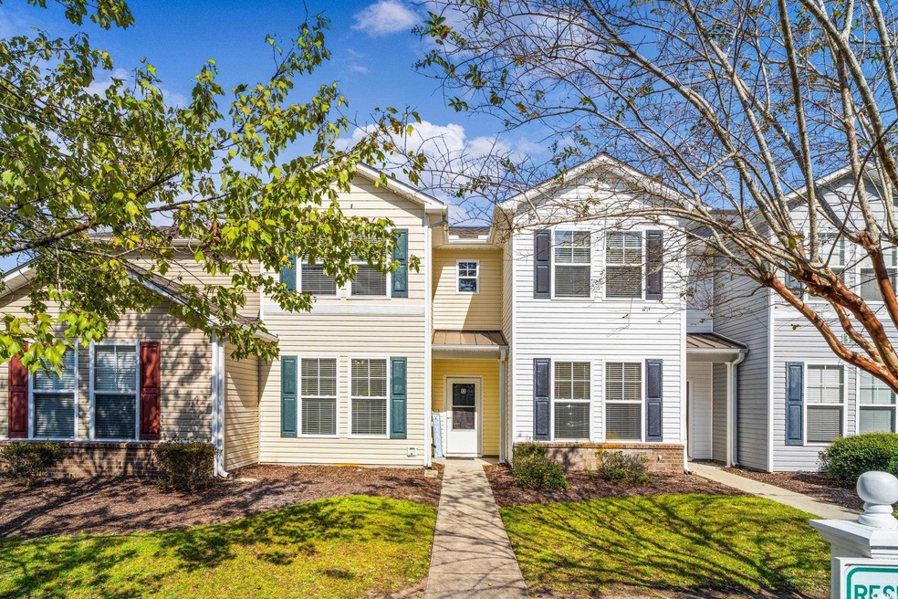View of front of property featuring a front lawn