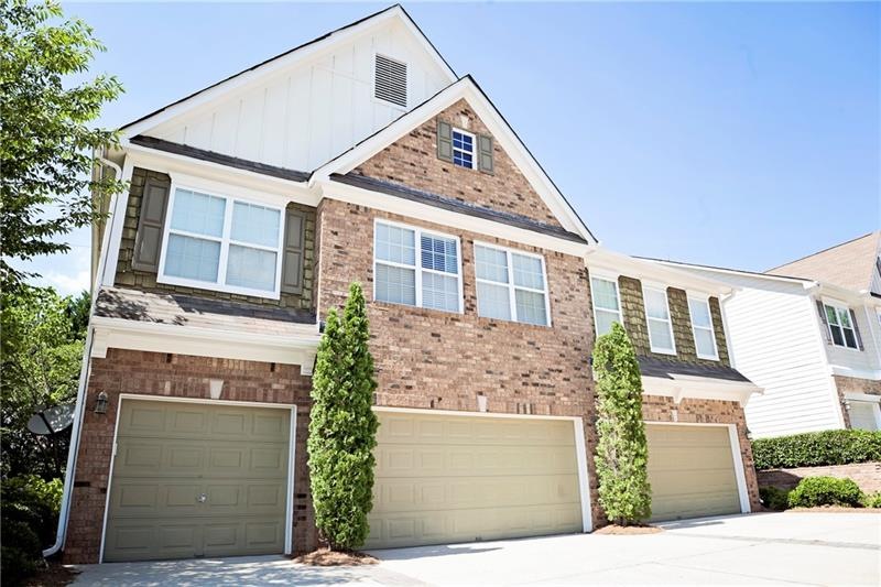 2 car garage in in the center, unit entrance is on