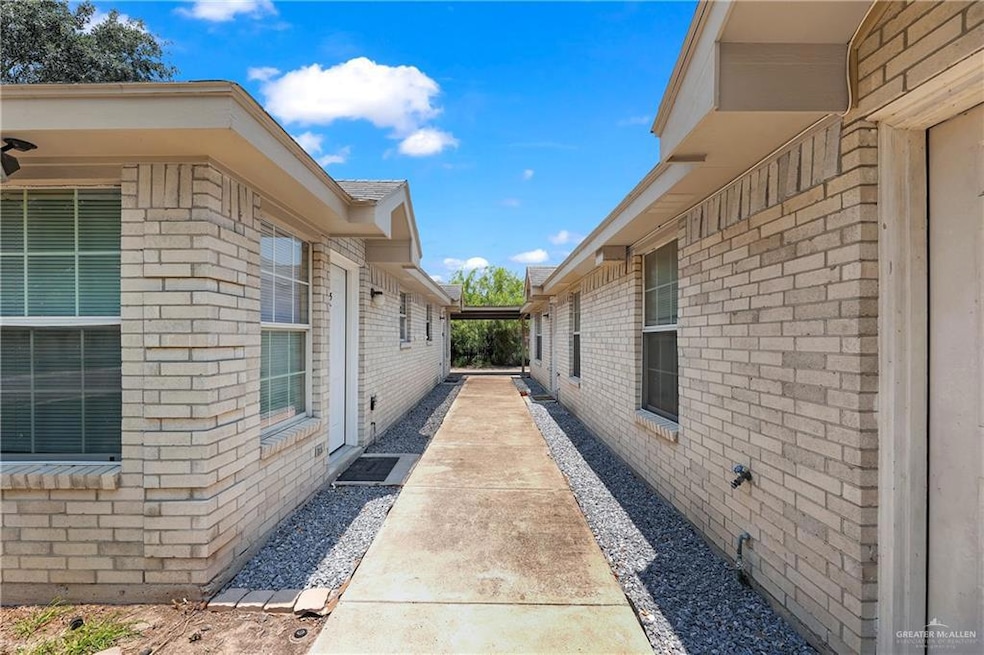 View of home's exterior featuring brick siding