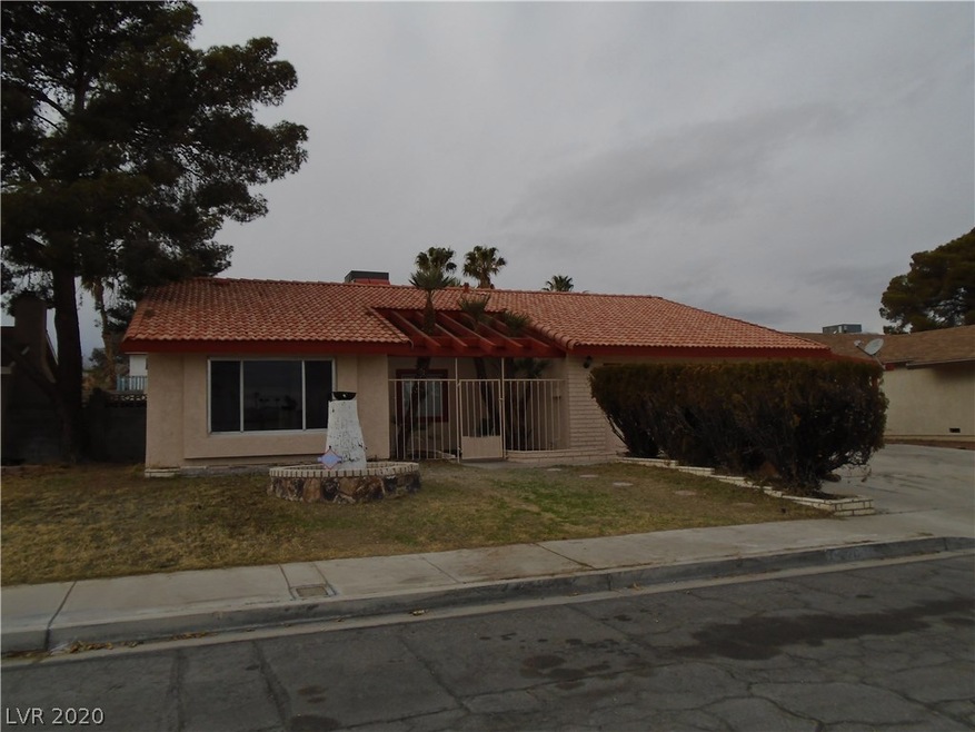 Front of home, Tiled roof and gated courtyard
