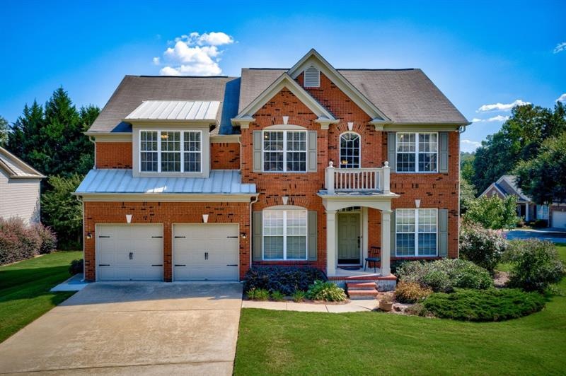 4 Side brick home with owner suite on main and ful