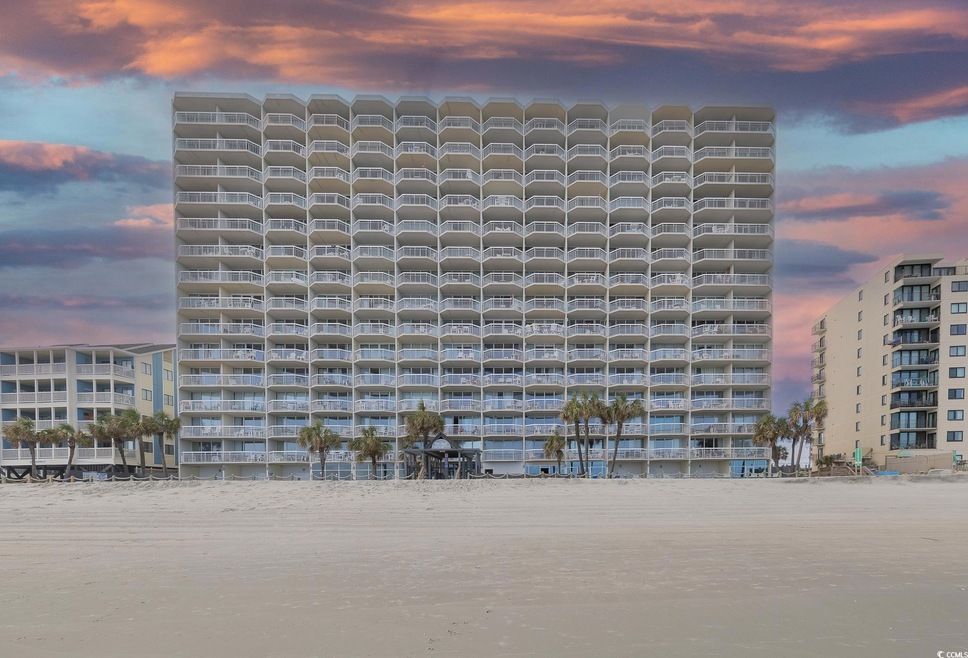 Outdoor building at dusk with a water view