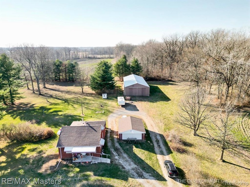 Quaint brick home sits on 38.5 acres!