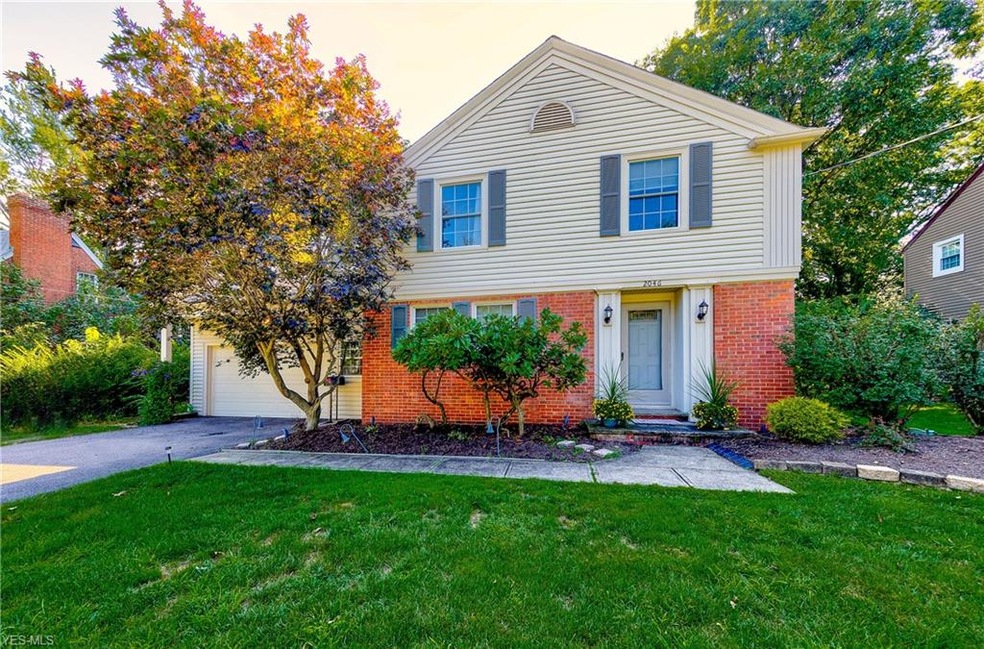 This gorgeous four bedroom, family home, with attached garage and new driveway, is nestled with landscaped gardens on a highly desirable street