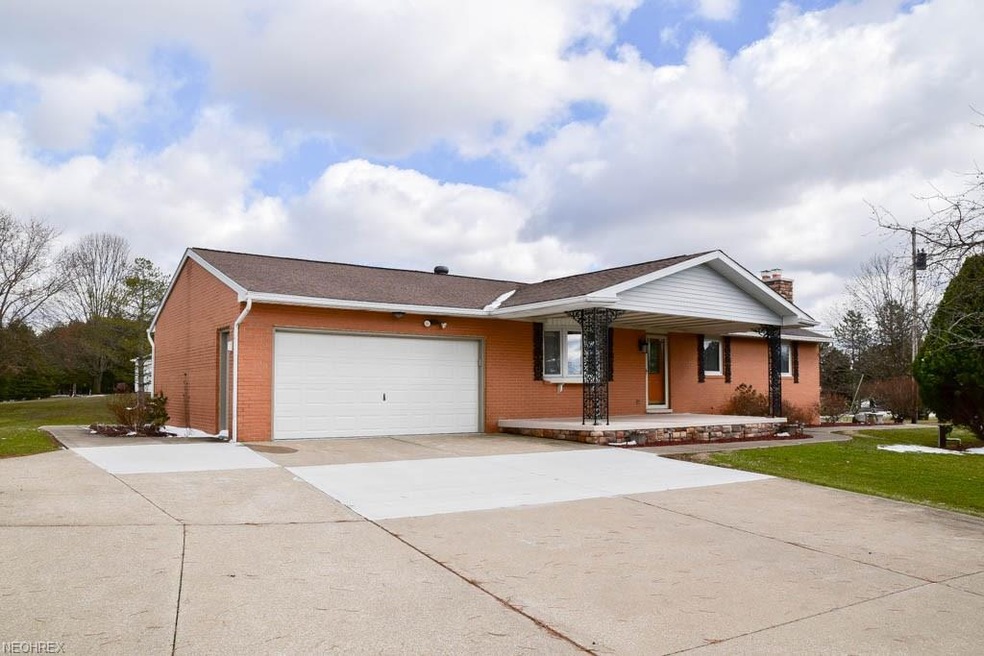 Custom-built, all brick 4 bedroom ranch with a fin