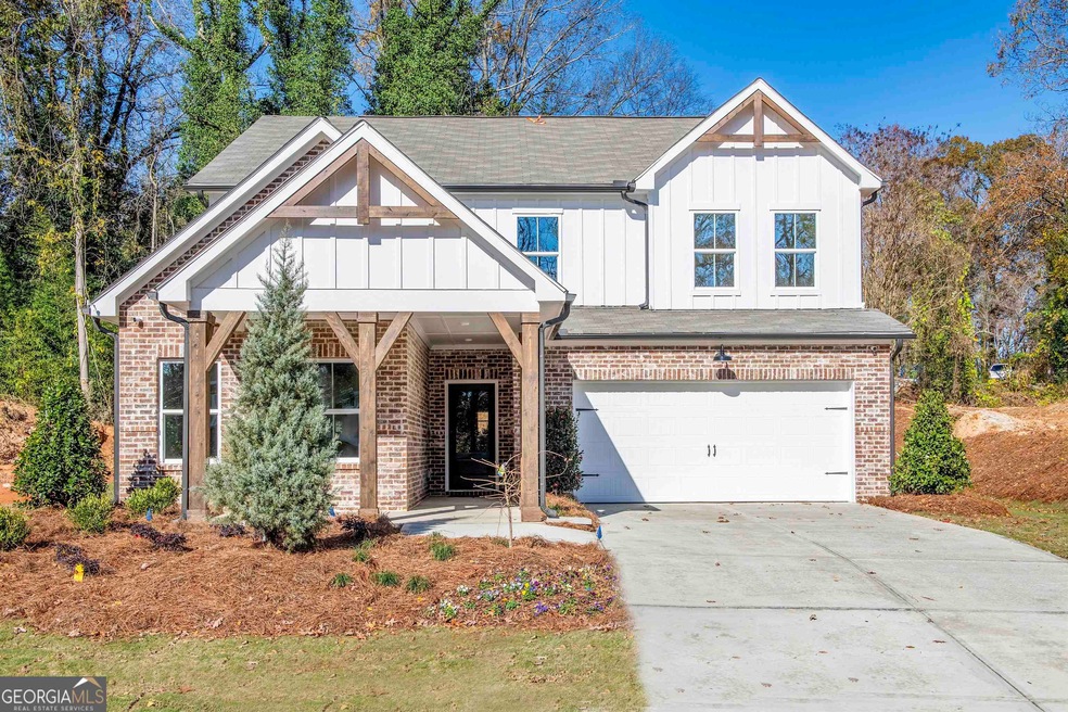 Beautiful Farmhouse style exterior on wooded lots