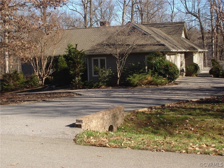 FRONT VIEW W/PAVED DRIVE TO PARKING AREA- START OF