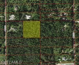 Aerial overview of property's location featuring property parcel outlined
