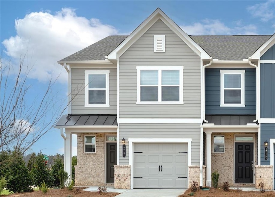 View of front facade with a garage