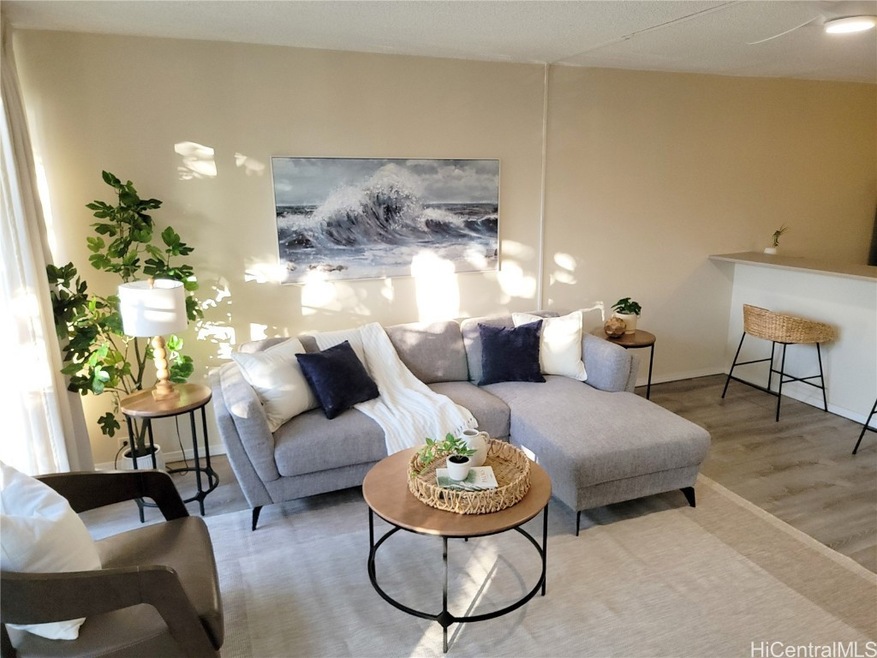 Spacious living area with lots of light throughout